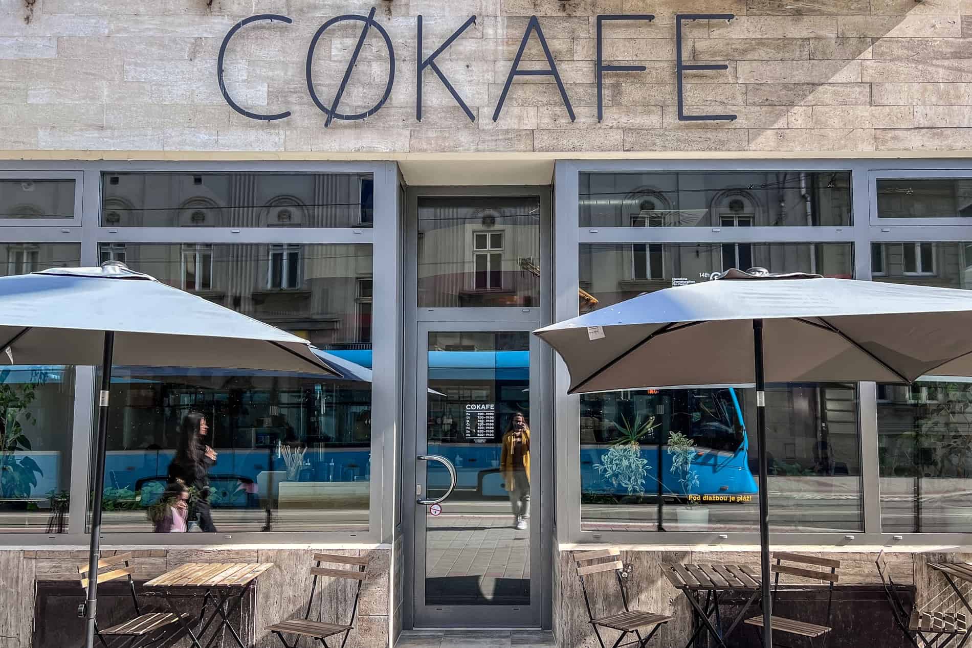 Exterior image of the glass fronted Cokafe coffee shop in Ostrava. 