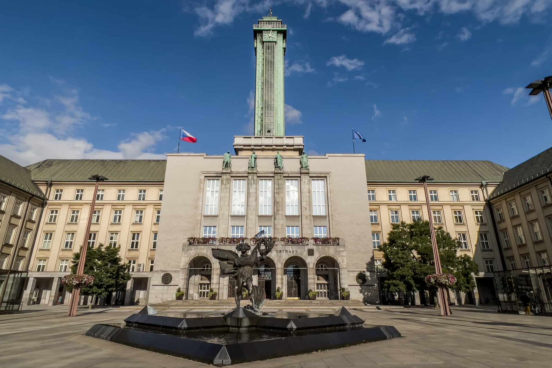 Ostrava's city hall building with a green clock tower. 