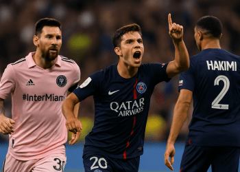 Alt Text: Joao Neves celebrates a goal for PSG with his finger raised, while Lionel Messi in an Inter Miami kit looks on and Achraf Hakimi stands nearby during the Club World Cup match.