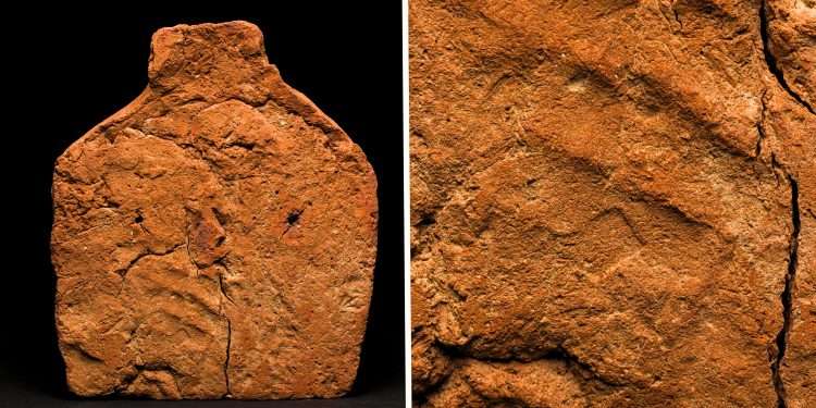 4000-Year-Old Handprint Found on Ancient Egyptian Soul House 1 Ancient 4,000-year-old Egyptian clay soul house with visible human handprint impression from the Middle Kingdom period, displayed on a black background.