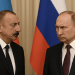 President Ilham Aliyev and President Vladimir Putin standing before their national flags with serious expressions, symbolizing rising diplomatic tensions between Azerbaijan and Russia in 2025.