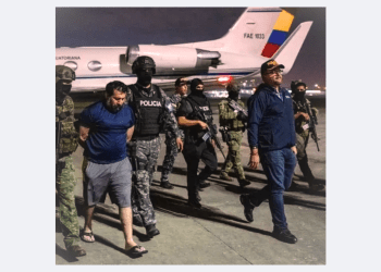How Fito’s Extradition Could Trigger Ecuador’s Deadliest Gang War Yet 5 Ecuadorian police escort drug lord Fito during extradition to the United States after his prison escape, night operation near military jet"